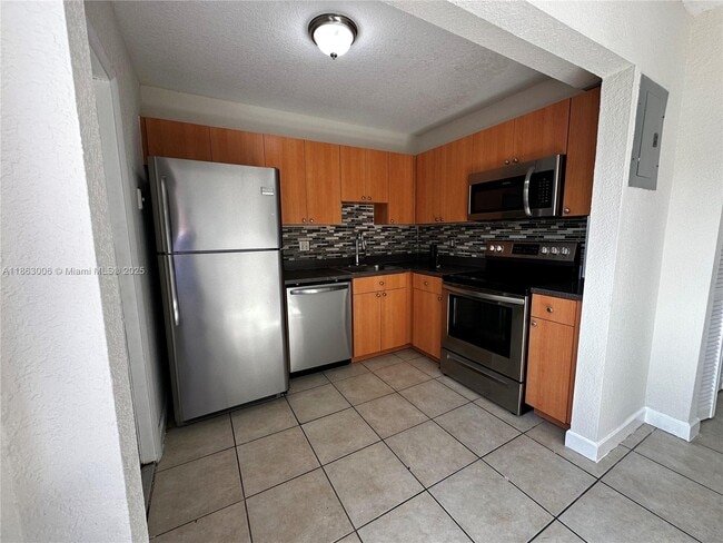 Building Photo - 4876 NW 9th Dr