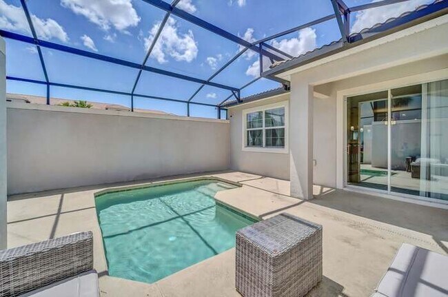 Building Photo - Unwind in Style: Heated Pool, Game Room, a...
