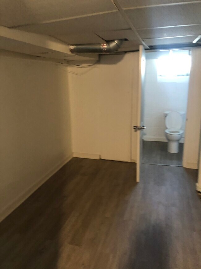 Living room looking into bathroom. - 22737 DONALD AVE