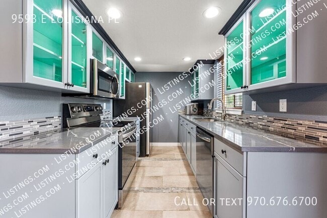 Building Photo - 9593 E Louisiana Pl