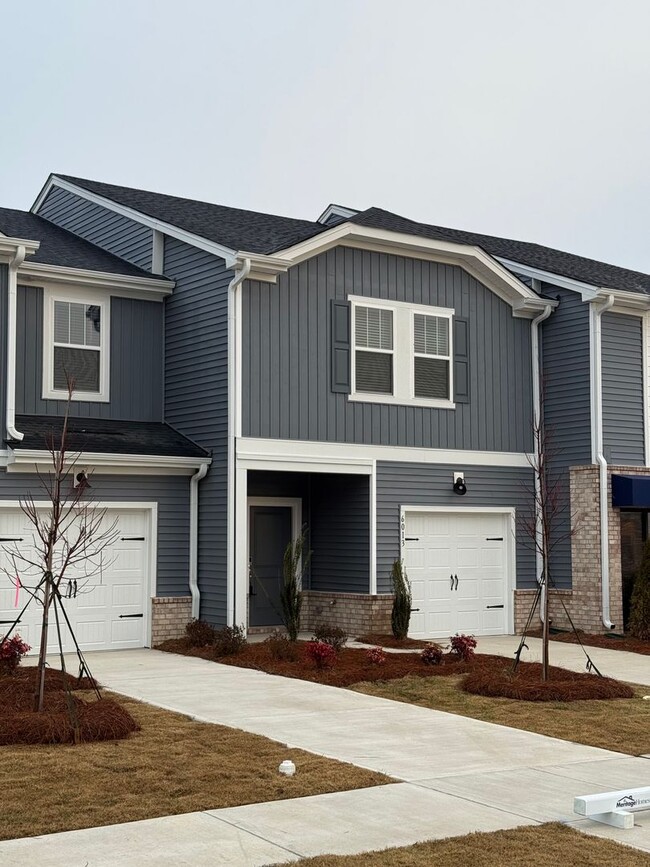 Building Photo - Brand New Townhome Available January 1st