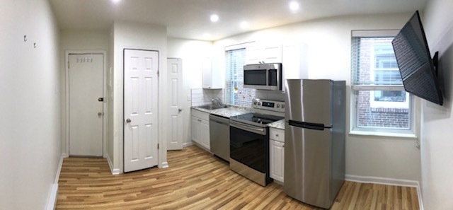 Kitchen Area with Closet and Bathroom doors on Left; LED Ceiling lights - 121 N 21st St