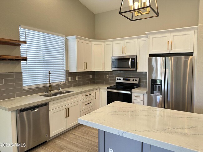 Foto del edificio - 10283 E Caribbean Ln