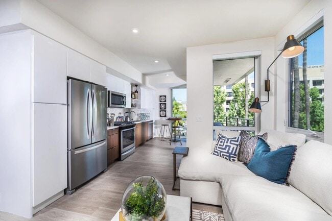 Bright kitchen with moveable island option and elegant open-shelving design. - 580 Anton