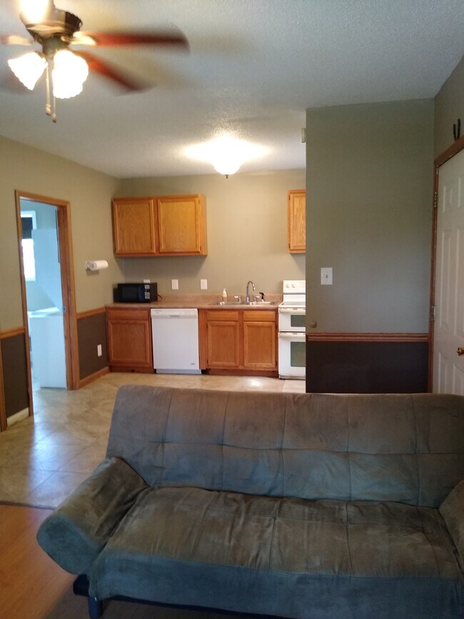 Expanded view of front door and kitchen - 122 N Hayden St