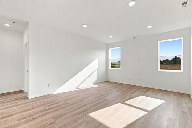 Building Photo - Modern 4-Bedroom Home with a 3-Car Garage & Covered Patio