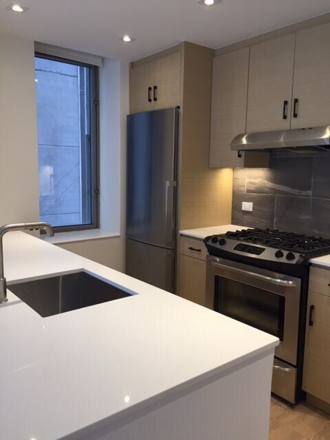 Building Photo - NEW CONSTRUCTION=LARGE TOP FLOOR=GREAT VIE...