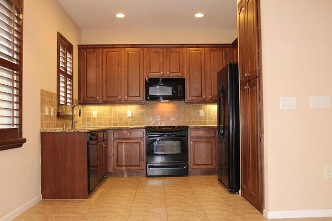 Building Photo - 7896 Picklewood Park Dr