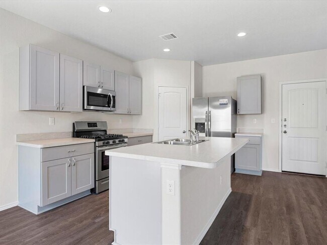 Building Photo - Three Bedroom | Two and a Half Bathroom Ho...