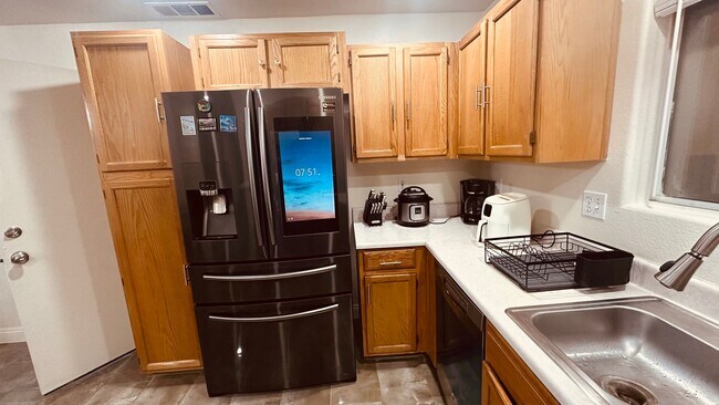 Building Photo - Furnished 3 Bedroom Home in Gated Community