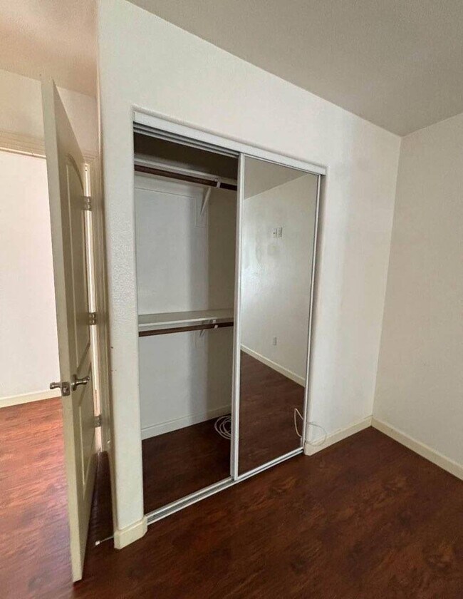 Mirrored sliding closet doors - 11147 Compton Ave