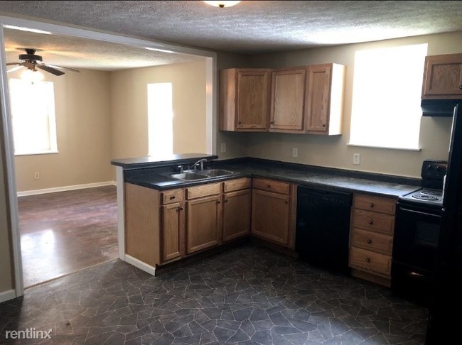 Foto del edificio - 4 br, 2.5 bath House - 1150 NW 5th Street