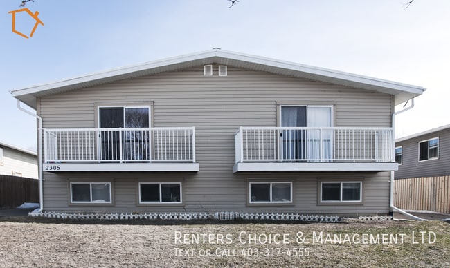 Building Photo - North Lethbridge Townhouse with Laundry, Parking, Balcony + Cats Ok