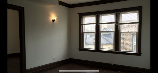 Building Photo - 9041 S Muskegon Ave