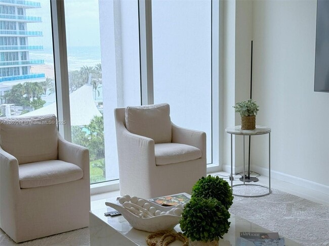Building Photo - 10275 Collins Ave