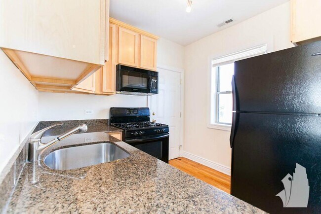 Foto del edificio - 1221 W Waveland Ave