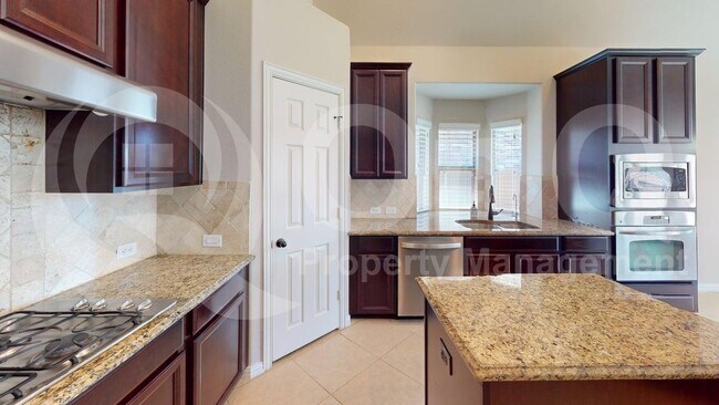 Foto del edificio - 7483 Hidden Cove Ln