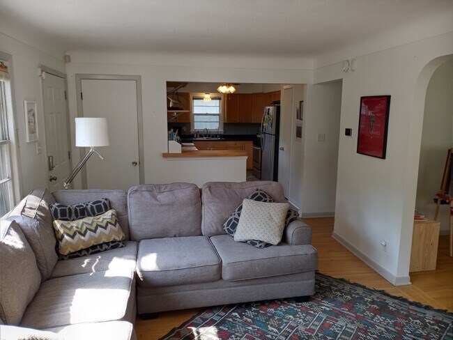 Looking from living room towards kitchen with dining area off to the right - 877 Clayland St