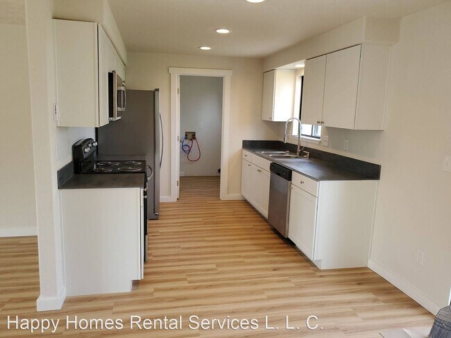 Building Photo - 3 br, 1.5 bath House - 1609 E. 1st Ave.