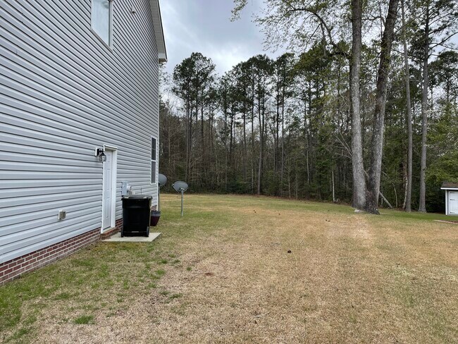 Right side of house - 204 Mia Ct