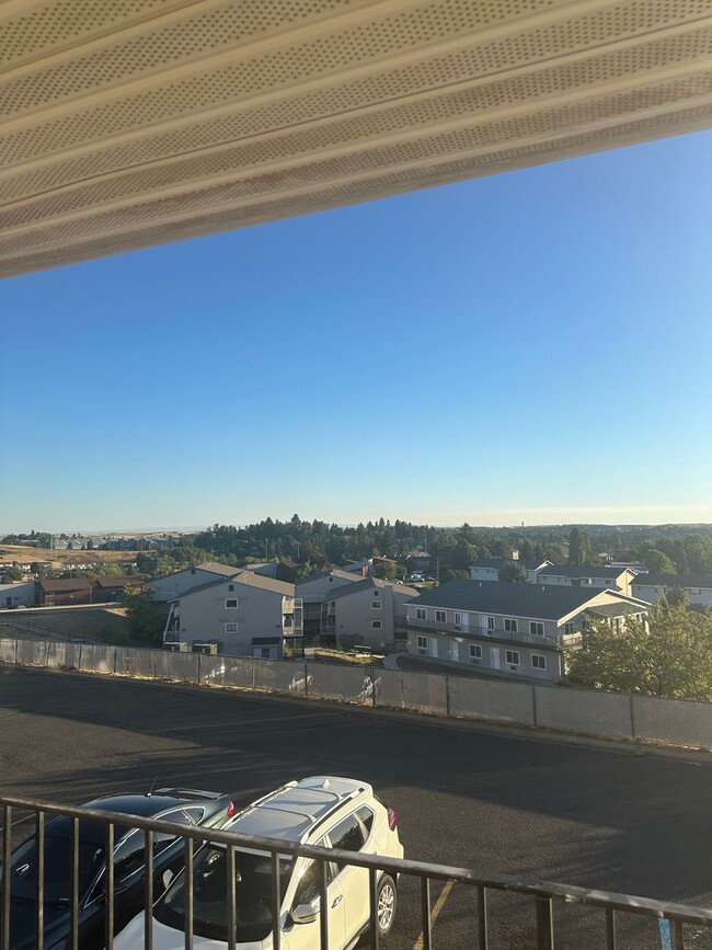 Building Photo - Live in Style and Comfort in this Charming...