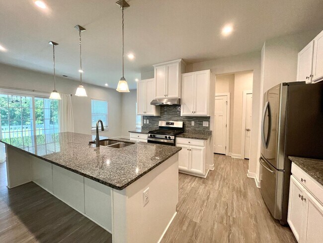 Building Photo - Huge home with two car garage with all the...