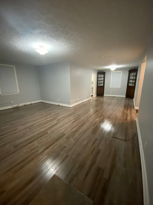 Great room/dining with built in cabinets - 5503 Staunton Ave SE