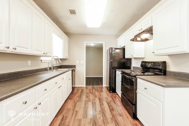 Foto del edificio - All Brick 4 Bedroom