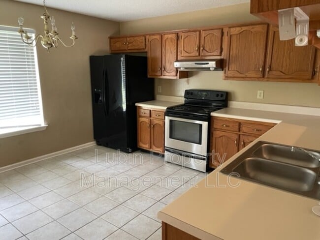 Building Photo - 7570 Spinola Ln