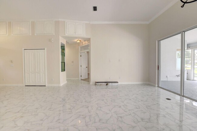 Foto del edificio - 8028 Plantation Lakes Dr