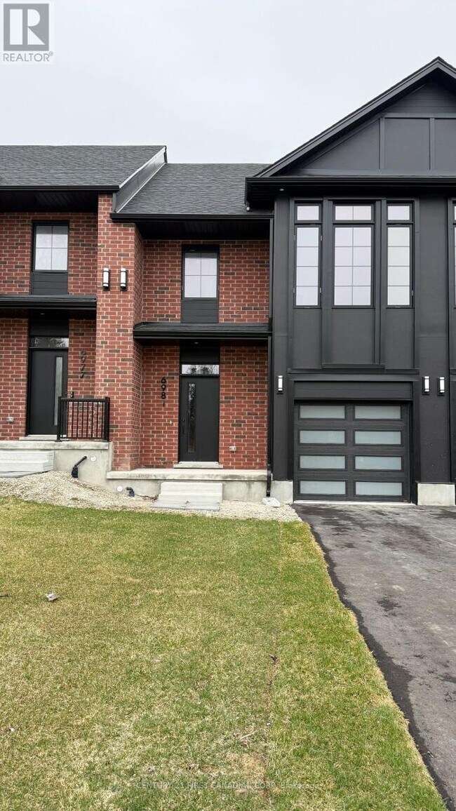 Photo du bâtiment - 6981 Heathwoods Ave