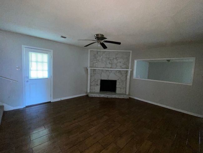Building Photo - 4BR/2BA Millington Rental with Hardwood Flooring, Rustic Fireplace & Large Yard