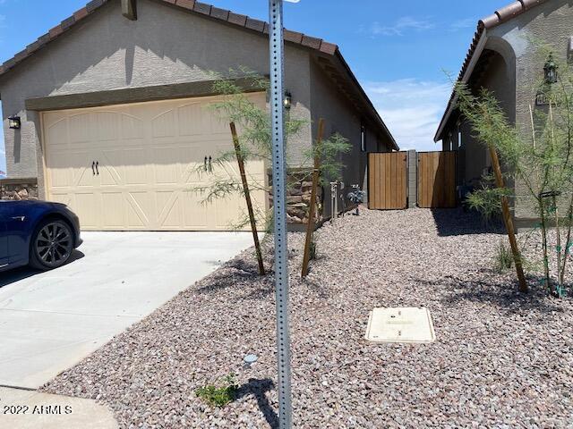 Building Photo - 40030 W Rio Lobo Dr