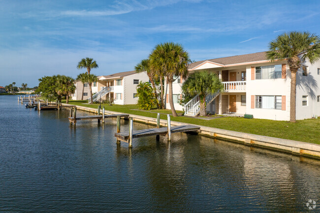 Stroll along the docks on the canal - Pines Resort & Apartments