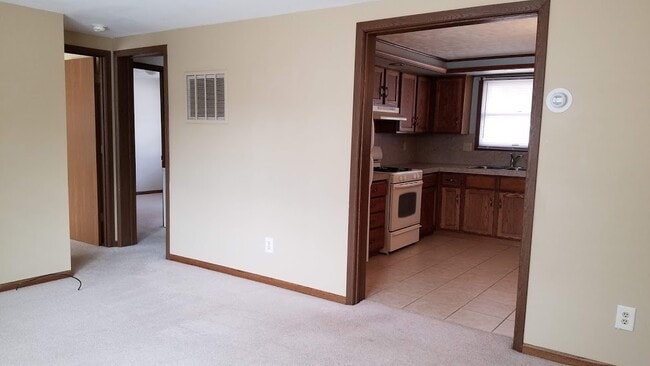 Sala de estar/cocina - 119 Columbia Dr