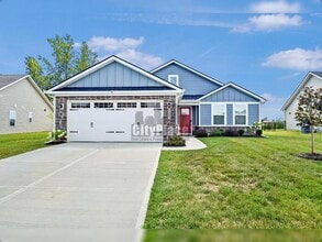 Building Photo - 7009 E Bean Blossom Dr