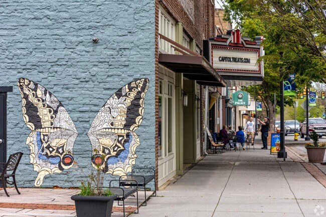 Take a photo in front of the butterfly wings mural near the shops and restaurants in downtown Maryville.