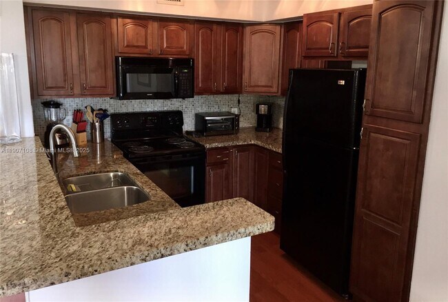 Building Photo - 19555 E Country Club Dr