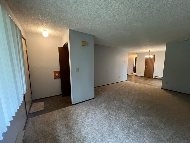 Building Photo - New Paint & Flooring! (Water & Garbage Included)