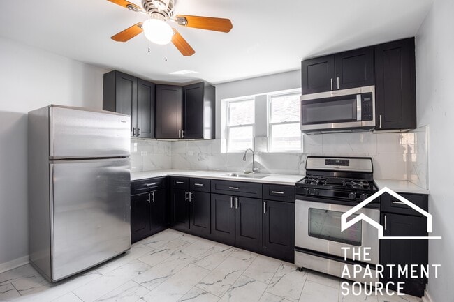 Building Photo - 5128 W Henderson St