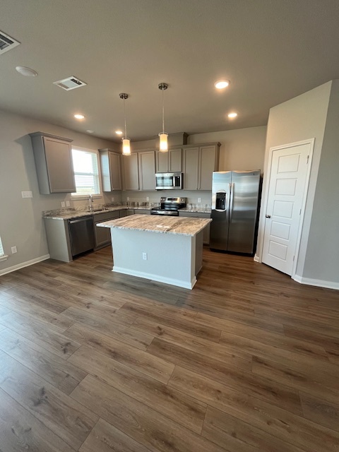 Kitchen as viewed from dining and living area. - 4116 Halo St