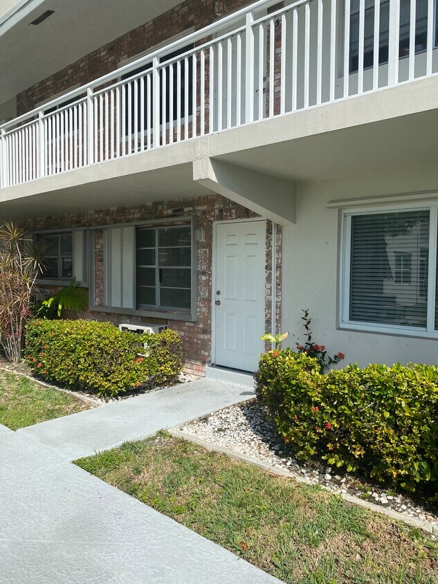 Front of Apartment View to Garden and Pool - 3860 NE 21st Way