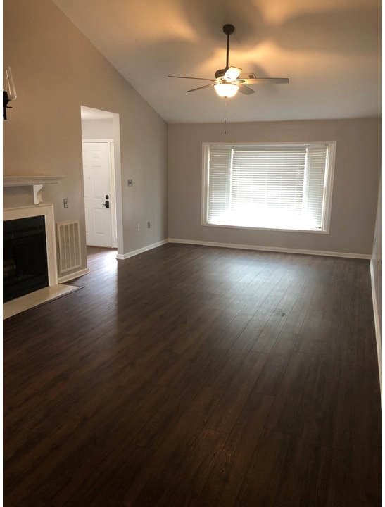 Great room looking at bay window - 313 Grace St