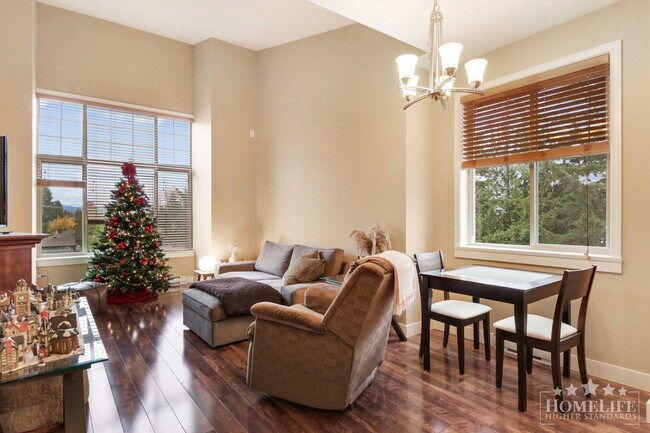 Photo du bâtiment - Exceptional Condo Living in the Heart of Maple Ridge — 1 Bed Plus Den / 1 Bath Corner Unit at Wel...