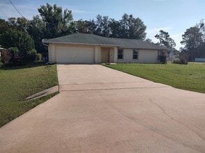 Building Photo - 6997 Hemlock Rd