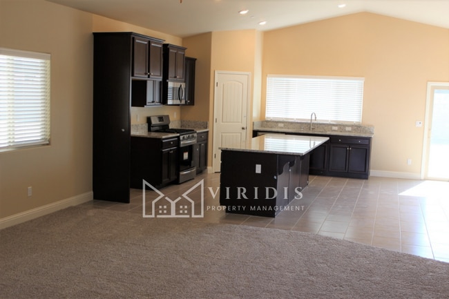 Building Photo - 5901 Blue Spruce Ave