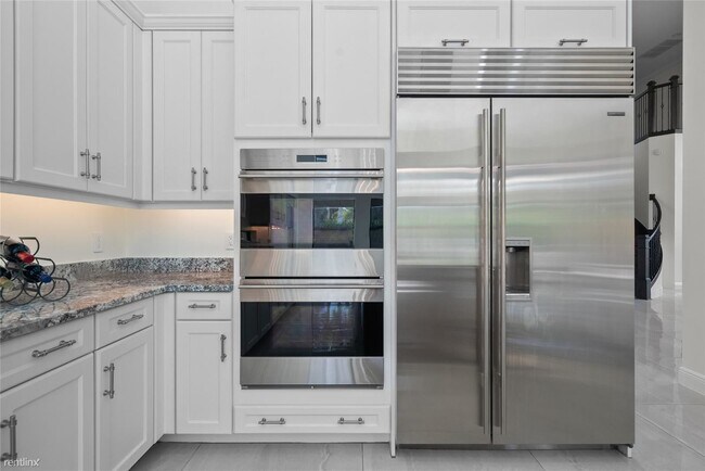 Building Photo - 5 br, 5.5 bath House - 2630 NW 69th St