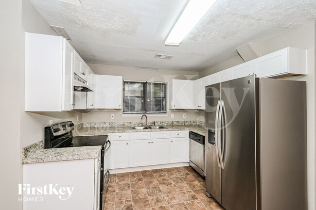 Foto del edificio - 6668 Windwood Cir