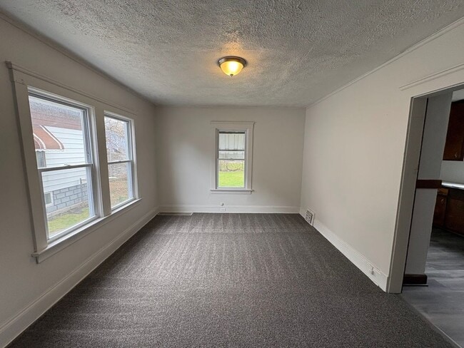 Building Photo - Three bedroom one bathroom 2 story home for rent