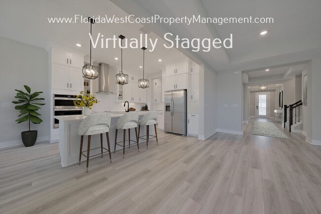 Building Photo - INCREDIBLE 5 BEDROOM/4.5 BATH/3 CAR GARAGE...